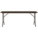 A brown Correll rectangular folding table with metal legs.