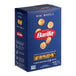 A 1 lb. box of Barilla Mini Wheels pasta.