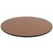 A round brown surface with black edges.