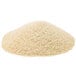 A close-up of a pile of Golden Dipt plain bread crumbs on a white background.