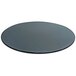 A Front of the House round smoke tempered glass buffet board with a black rim.
