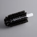 A black and white circular brush with a Galaxy logo.