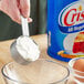 A measuring cup of Crisco shortening.