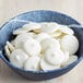 A bowl of Alpine white coating wafers.