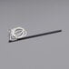 A metal rod with a white cord attached to one end.