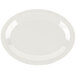 A white oval melamine platter with a white rim.