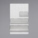 A white wall with a Quantum white steel louvered panel.
