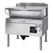 A Cleveland stainless steel liquid propane tilt skillet on a counter.