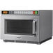 A Panasonic stainless steel commercial microwave oven with a digital display.