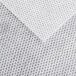 A close-up of a white fabric with a gray pattern.