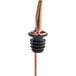 An Acopa copper and black liquor pourer with a metal cap.