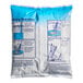 A close-up of a white and blue DOLE Soft Serve Pomegranate Mix bag with instructions.