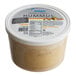 A 3.75 lb. tub of Grecian Delight Traditional Hummus.