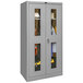 A gray metal wardrobe cabinet with safety-view glass doors.