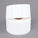 A roll of white Cardinal Detecto labels.