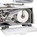 A Cardinal Detecto P205 label printer with a roll of white labels inside.