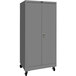 A grey metal Hallowell storage cabinet with wheels.