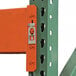 A close-up of a blue metal Vestil pallet racking frame.