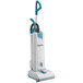 A Makita upright vacuum cleaner with a white base and blue handle.