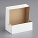 A white Baker's Mark bakery box with a lid open.