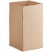 A close-up of a brown Lavex cardboard shipping box with a cut-out top.