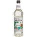 A close up of a Monin peppermint syrup bottle.