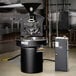 A Giesen W15A commercial coffee roaster with a touchscreen.