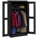 A black Tennsco wardrobe cabinet with C-thru doors holding coats.