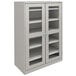 A light gray Tennsco storage cabinet with C-Thru doors.