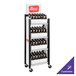 An IRP Customizable Mini Rack with Slanted Shelves holding bottles on a cart.