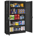 A black metal Tennsco storage cabinet with many items inside.