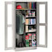 A Tennsco light gray metal combination cabinet with open C-Thru doors.
