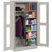 A light gray Tennsco standard combination cabinet with C-Thru doors and shelves.