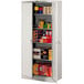 A light gray Tennsco metal storage cabinet with shelves full of items.