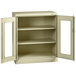 A putty storage cabinet with open C-thru doors.