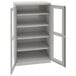 A light gray metal Tennsco storage cabinet with open doors.