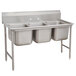 A stainless steel Advance Tabco three compartment sink.