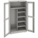 A light gray metal Tennsco combination cabinet with open doors.