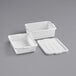A white polypropylene container with a lid.
