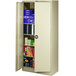 A white metal Tennsco storage cabinet with solid doors open.