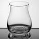 A close-up of a Stolzle Canadian Whiskey glass with a clear rim.