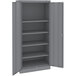 A dark gray metal Tennsco storage cabinet with solid doors.