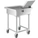 A stainless steel Regency sink with a detachable silverware chute on wheels.