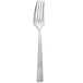 An Amefa stainless steel table fork with a silver handle.