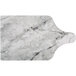 A close up of an Enjay marble and wood reversible cake board with a white handle.