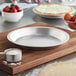 A close up of Choice aluminum pie pans.