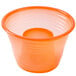 A neon orange plastic cup with a round center and a hole on the side.