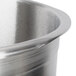 A close-up of a Robot Coupe stainless steel bowl assembly.