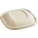 A white fiber lid for a World Centric container.