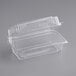 A clear World Centric hinged clamshell container with a lid.